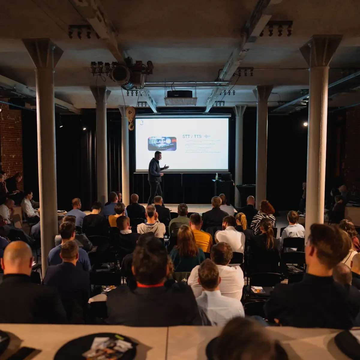 Audience at a Sellium talk on AI in mid-sized companies